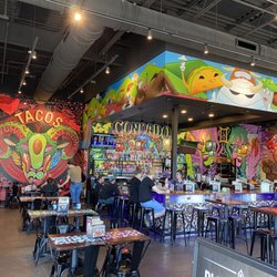 Condado Tacos - Bar with murals