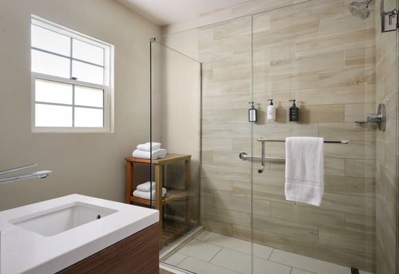Diamond Head Inn - A renovated bathroom with updated finishes and a modern shower in Pacific Beach, offering a clean and refreshed space. - San Diego, CA