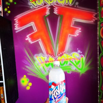 Foreign Flavorz - a hand holding a bottle of soda - Candy Stores Near Me - Freeport, New York Foreign Flavorz - a hand holding a bottle of soda - Candy Stores Near Me - Freeport, New York
