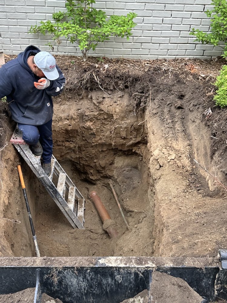 Slide of The Drain Guys