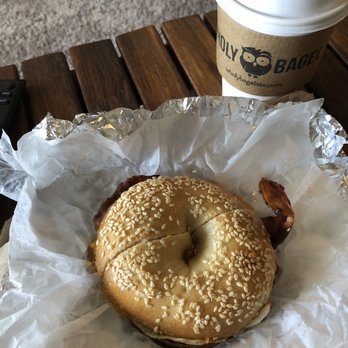 Wholy Bagel - Bacon, egg, and cheese on a sesame bagel and a small coffee - Bagels Near Me - Austin, Texas