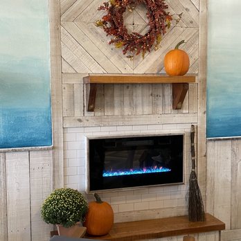 Playa Bowls - a fireplace in a living room - Acai Bowls Near Me - Wesley Chapel, Florida