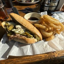 Black Bear Bar & Grill - Beef sandwich with Swiss and Onion Rings. Blackened shrimp tacos.