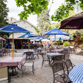 Riley & Jake's - a patio with tables and umbrellas - American Near Me - Clinton, New Jersey Riley & Jake's - a patio with tables and umbrellas - American Near Me - Clinton, New Jersey
