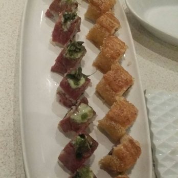 Minami - Minami roll on the left with the wasabe creme fresh. And champagne roll with the unagi topping on the right. - Japanese Near Me - Vancouver, British Columbia Minami - Minami roll on the left with the wasabe creme fresh. And champagne roll with the unagi topping on the right. - Japanese Near Me - Vancouver, British Columbia