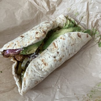 CAVA - Spicy chicken and avocado. Was supposed to be a bowl but came as a pita - Salad Near Me - Tampa, Florida CAVA - Spicy chicken and avocado. Was supposed to be a bowl but came as a pita - Salad Near Me - Tampa, Florida