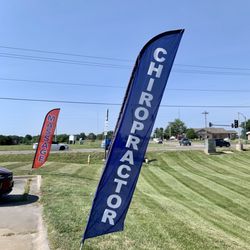 Warrensburg Wellness - Swooper flags in parking lot