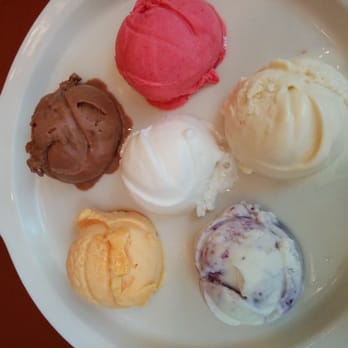Splendora's Gelato Cafe - Raspberry sorbet, roasted almond, blueberry and lemon zest, peach sorbet, mexican coffee (clockwise), and lemon sorbet (middle). - Gelato Near Me - Charlottesville, Virginia