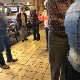 The 8 people waiting to check out including myself. People walked by several times and just ignored us all.