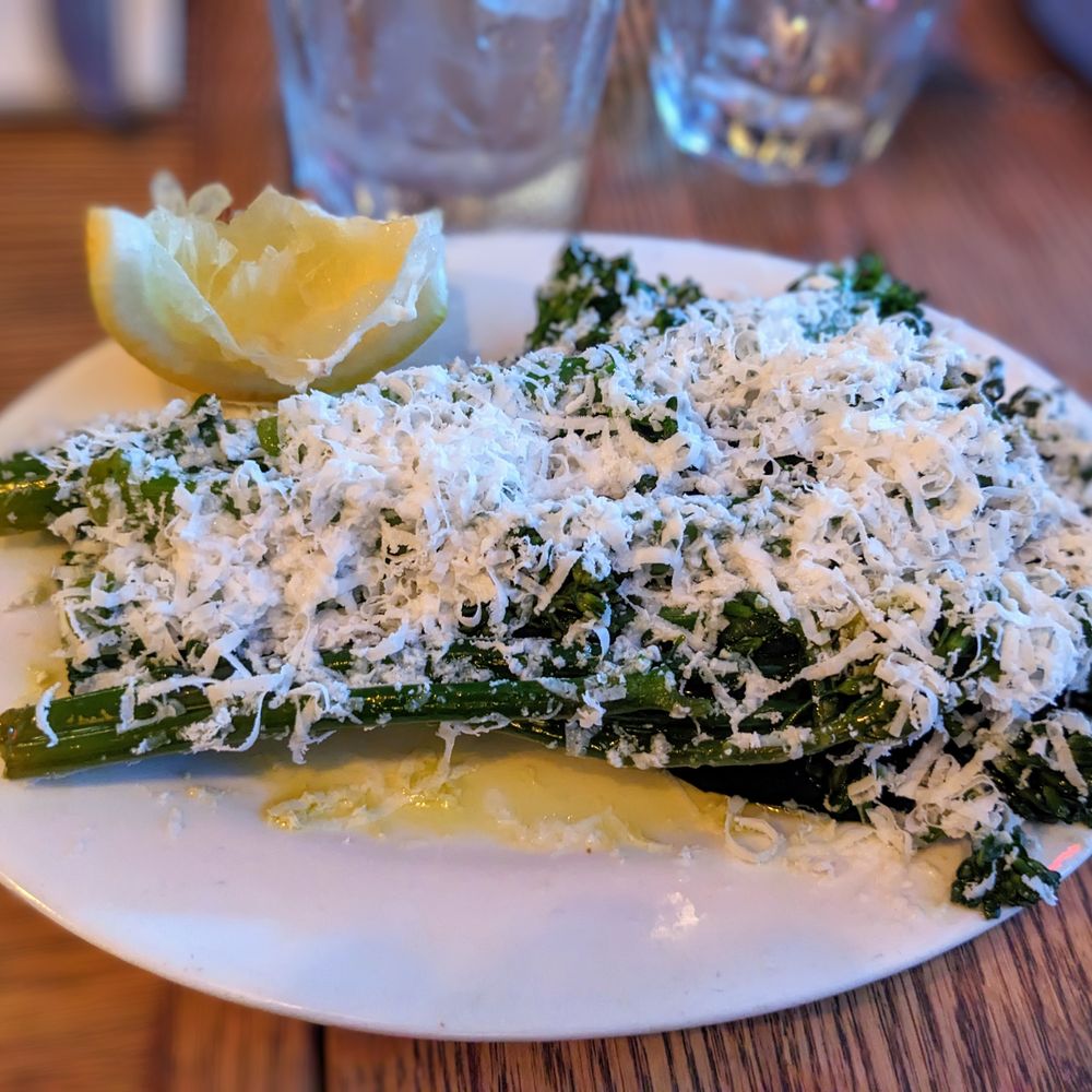 Trapizzino - a plate of asparagus and parmesan cheese - Italian Near Me - New York, New York Trapizzino - a plate of asparagus and parmesan cheese - Italian Near Me - New York, New York