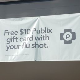 a sign that reads, free $ 10 publix gift card with your flu shot a sign that reads, free $ 10 publix gift card with your flu shot