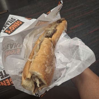 Geno's Steaks - Cheesesteak with provolone and grilled onions--needed salt - Sandwiches Near Me - Philadelphia, Pennsylvania Geno's Steaks - Cheesesteak with provolone and grilled onions--needed salt - Sandwiches Near Me - Philadelphia, Pennsylvania