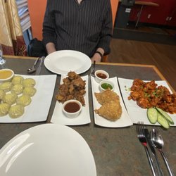 Swagat India Bar and Bistro - Dinner... Momos, Paneer Pakora, Samosas, and  Cauliflower 65.