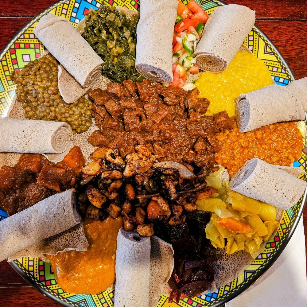 Tabor Ethiopian Restaurant - The dinner for two with spicy chicken. Outstanding flavor and value considering all the food you get. - Ethiopian Near Me - Baltimore, Maryland Tabor Ethiopian Restaurant - The dinner for two with spicy chicken. Outstanding flavor and value considering all the food you get. - Ethiopian Near Me - Baltimore, Maryland