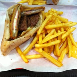 Planète food - Radical Sandwich: 2 hamburger patties, cordon bleu, egg, fries and spicy sauce. Yummy!!