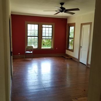 Jabco Services - an empty room with a fan - Handyman Near Me