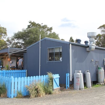Freycinet Marine Farm - View of storefront from the back in the parking lot. - Seafood Near Me - Coles Bay, TAS Freycinet Marine Farm - View of storefront from the back in the parking lot. - Seafood Near Me - Coles Bay, TAS