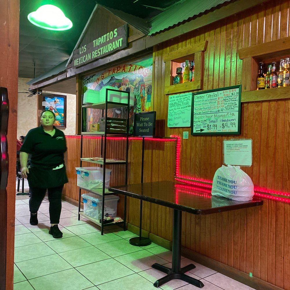Los Tapatios Mexican Restaurant - a woman walking by - Mexican Near Me - Choctaw, Oklahoma Los Tapatios Mexican Restaurant - a woman walking by - Mexican Near Me - Choctaw, Oklahoma