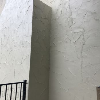 KM Lath & Plaster  - Finished repair, fireplace. - Stucco Services Near Me