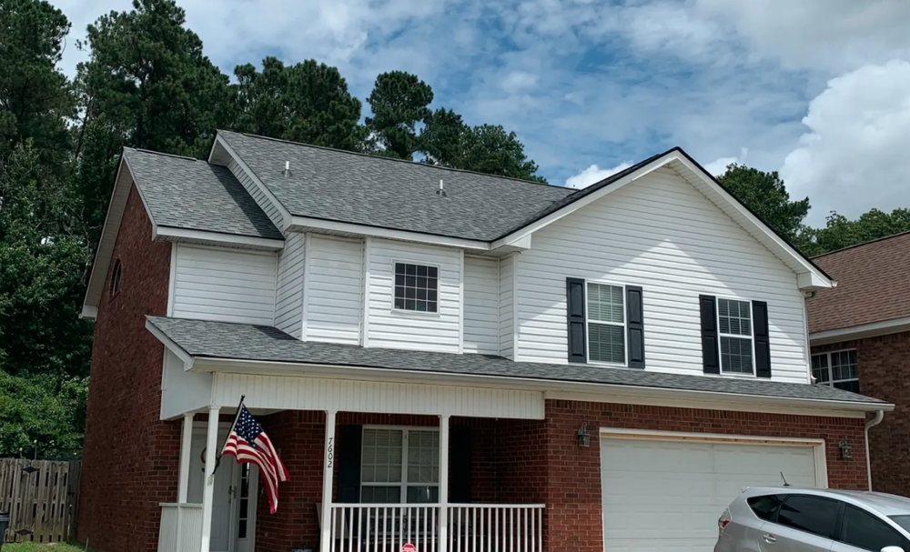 Slide of Gunn Roofing