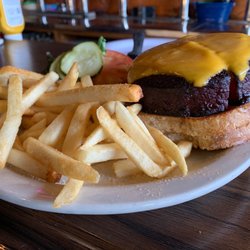 Dan's Downtown Tavern - Fried bologna sandwich - "Thick cut" is an understatement for this monster slab of bologna.