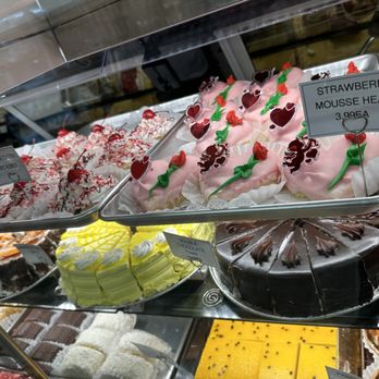 Devon Market - a variety of cakes on display - International Grocery Near Me - Chicago, Illinois