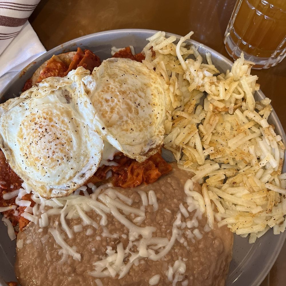 Barrio Eats & Drinks - Chilaquiles rojas with eggs, beans, and hash browns. - Mexican Near Me - El Paso, Texas Barrio Eats & Drinks - Chilaquiles rojas with eggs, beans, and hash browns. - Mexican Near Me - El Paso, Texas