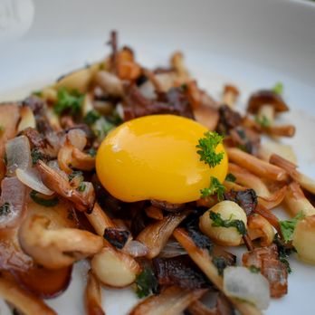 Boulevard Bistro - a plate of food with an egg on top - New American Near Me - Elk Grove, California