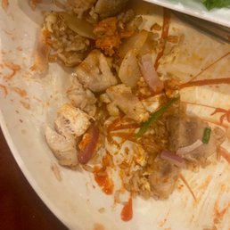 a plate of food with meat and lettuce