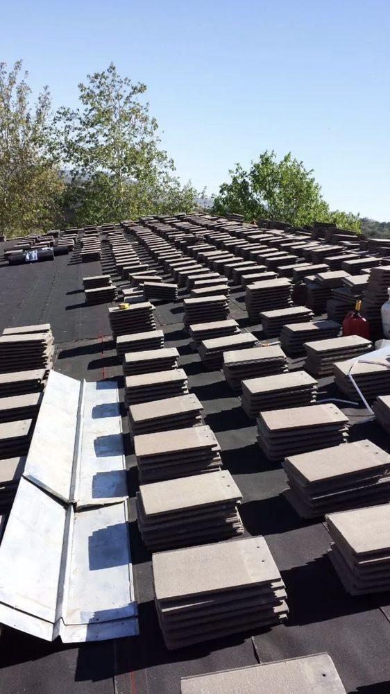 Slide of Romero's Roofing