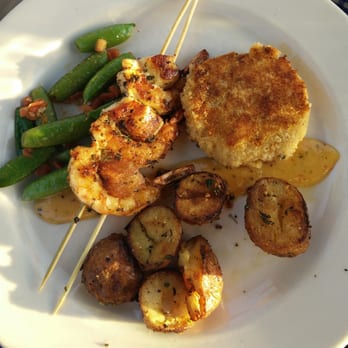 Duke's Seafood - Shrimp skewers and crab cakes. - Seafood Near Me - Seattle, Washington Duke's Seafood - Shrimp skewers and crab cakes. - Seafood Near Me - Seattle, Washington
