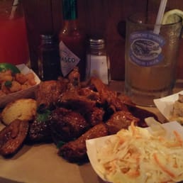 Popcorn shrimps, half-bucket of pork ribs, coleslaw side, and potato salad side. Bourbon-based watermelon and lemonade iced tea cocktails