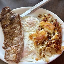 New York Steak & Eggs with hashbrowns and toast New York Steak & Eggs with hashbrowns and toast