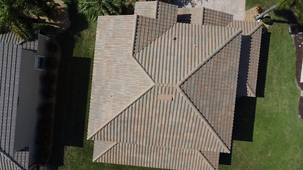 Slide of D’ Roofing Group