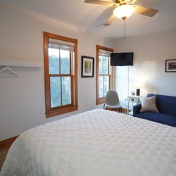 Root River Inn & Suites - Fountain Room.Facing the trail, town and garden. Interior entrance.