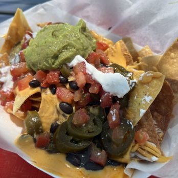 Canyon Spring's Bar & Grill - Nachos and it was piled and layered. Much more than you would think. - American Near Me - Phoenix, Arizona Canyon Spring's Bar & Grill - Nachos and it was piled and layered. Much more than you would think. - American Near Me - Phoenix, Arizona