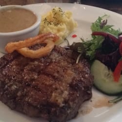 Meatery Grill and Bar - My scotch fillet with congac and pepper sauce and token salad and dollop of mash potato