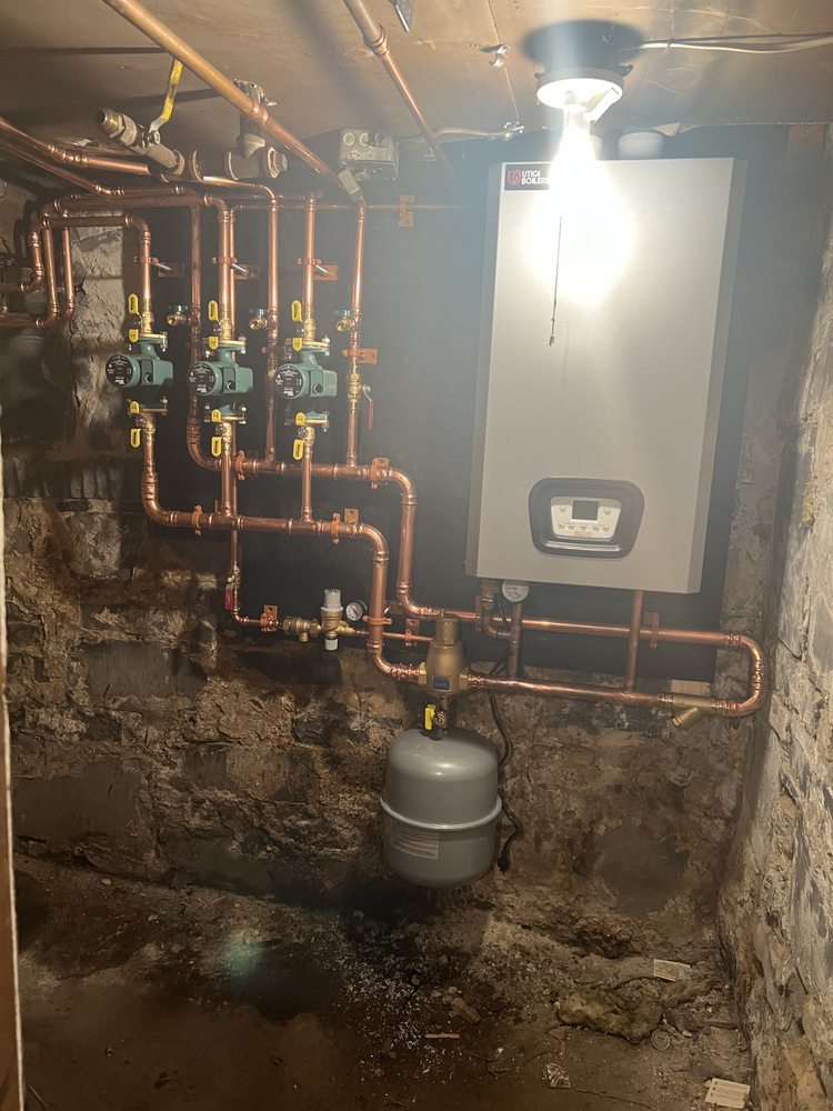 Slide of Wollman Heating and Plumbing