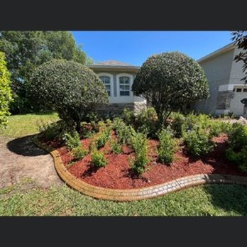 AdvanceScape - the front yard of a home with landscaping - Lawn Services Near Me - Clermont, Florida