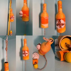 My Painted Crafts - Wine bottle wind chime with hydro dipped orange and yellow, twine wrapped and cotton flower.