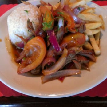 Ceviche House - Lomito Saltado! White Rice, beef, sauteed onions & tomatoes and french fries in gravy! Peruvian! - Seafood Near Me - Orlando, Florida Ceviche House - Lomito Saltado! White Rice, beef, sauteed onions & tomatoes and french fries in gravy! Peruvian! - Seafood Near Me - Orlando, Florida