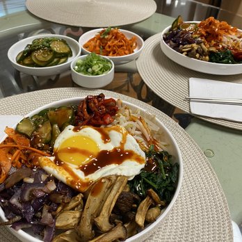 H Mart - Little Ferry - Supreme Vegetable Bibimbap with homemade banchan. Fried egg and gochujang sauce are non-negotiable. - Grocery Near Me - Little Ferry, New Jersey H Mart - Little Ferry - Supreme Vegetable Bibimbap with homemade banchan. Fried egg and gochujang sauce are non-negotiable. - Grocery Near Me - Little Ferry, New Jersey