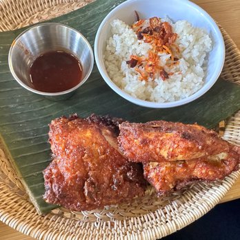 Rangoon Bistro - 1/4 fried chicken served with coconut rice and chili condiment. The chili condiment is on the sweet side, but still good. - Burmese Near Me - Portland, Oregon Rangoon Bistro - 1/4 fried chicken served with coconut rice and chili condiment. The chili condiment is on the sweet side, but still good. - Burmese Near Me - Portland, Oregon