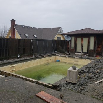 Ole's Pool & Spa - Complete pool remodel project.  Just beginning the demolition of deck, tile, and coping. - Pool & Hot Tub Service Near Me - Port Orchard, Washington