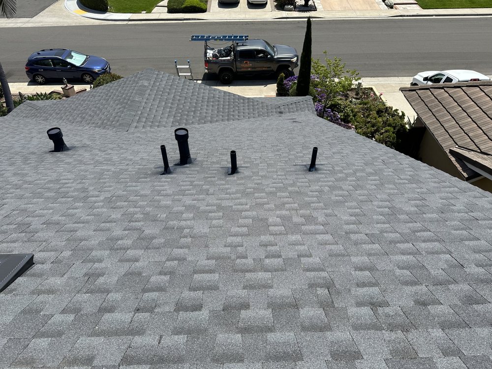 Slide of Rod's Roofing