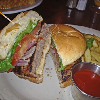 Killarney's Irish Pub & Grill - Killarney Burger Interior $8.50: 1\2 lb ground chuck, lettuce, tomato, onions, mayo. Not med rare as requested. - Pubs Near Me - Temecula, California Killarney's Irish Pub & Grill - Killarney Burger Interior $8.50: 1\2 lb ground chuck, lettuce, tomato, onions, mayo. Not med rare as requested. - Pubs Near Me - Temecula, California