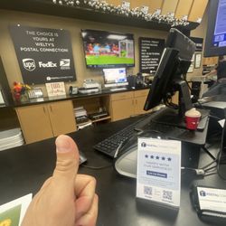 Welty's Postal Connection - Device desk with sports!