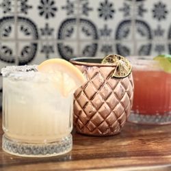 Carrera's Tacos - Paloma, Mezcal Mule, and Strawberry Margarita.