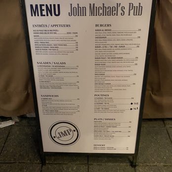 John Michael's Pub - a menu on a stand - Pubs Near Me - Montreal, Quebec