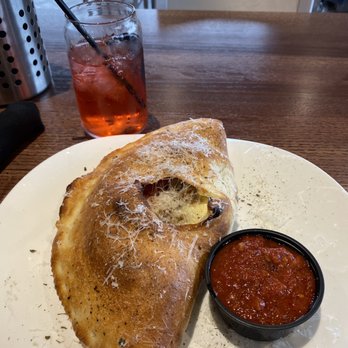 Sauce on the Side - The Meet Me in St. Louis calzone - Italian Near Me - Carmel, Indiana Sauce on the Side - The Meet Me in St. Louis calzone - Italian Near Me - Carmel, Indiana